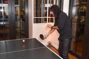 Alice Cooper plays ping pong at the Kirk Gibson Foundation's Fundraiser